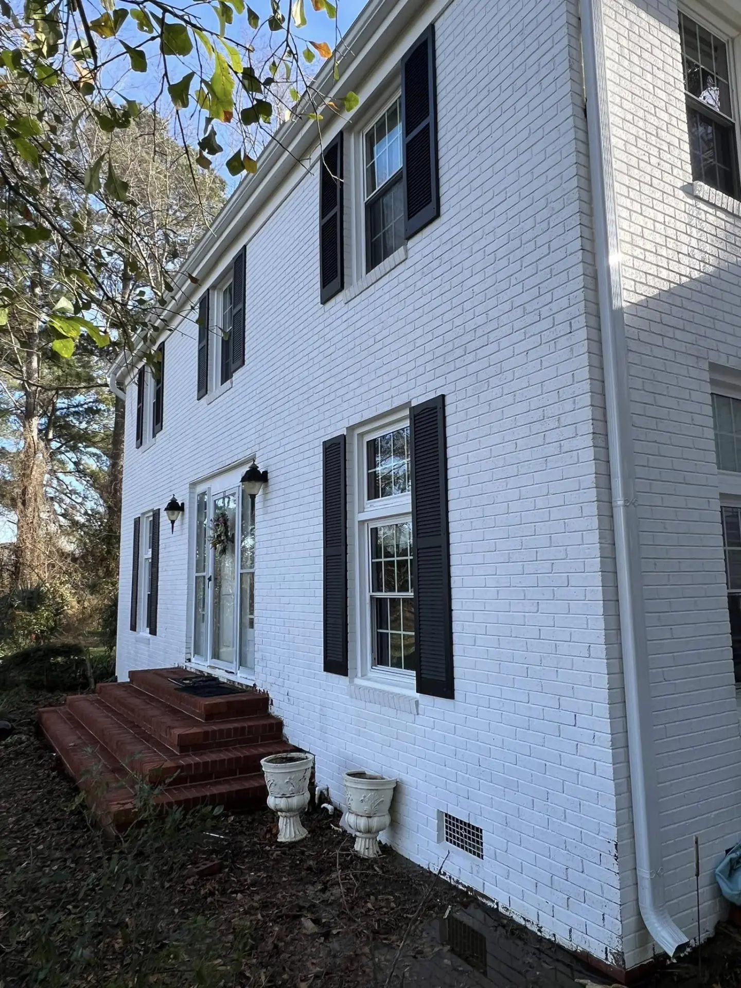 House Washing — White brick home